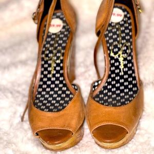 Tan wedges, worn and little scuffs.